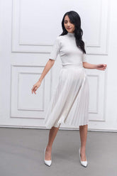 High-waisted pleated midi skirt in breathable lightweight silk fabric for effortless elegance
